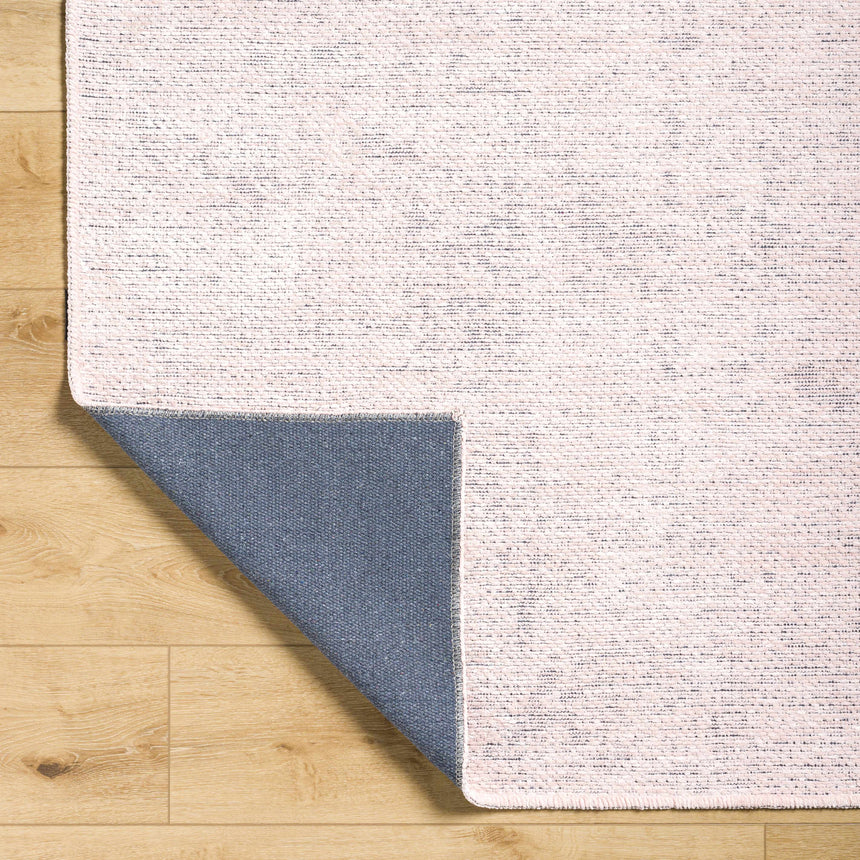 Isako Dusty Pink Solid Washable Area Rug - Clearance