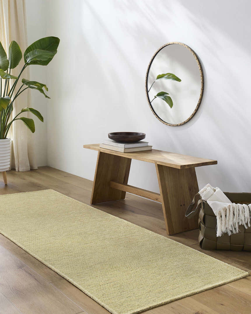 Entryway with wood floors, bench, and lime green Isako Solid Lime Washable Area Rug. Modern, minimalist style. Roomscene-Runner