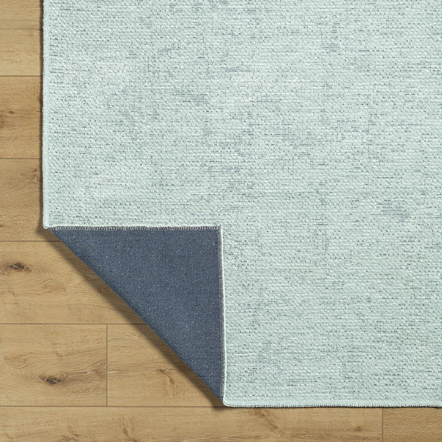 Isako Seafoam Solid Washable Area Rug - Clearance