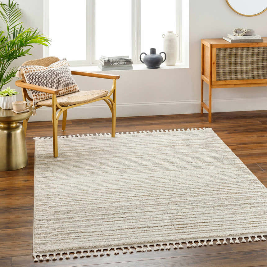 Living room scene with neutral tones and a beige striped Levy Area Rug. Roomscene-Rectangle