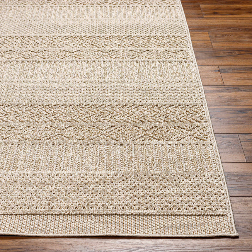 Corom Beige Area Rug - Clearance