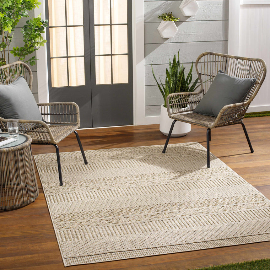 Corom Beige Area Rug - Clearance