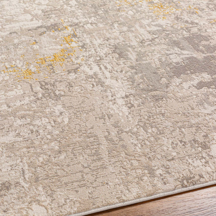 Close-up of the Yuji Area Rug in beachhouse colors, showcasing its contemporary pattern and soft, textured weave. Texture