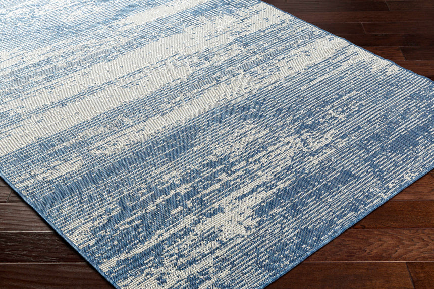 Cline Blue Area Rug - Promo