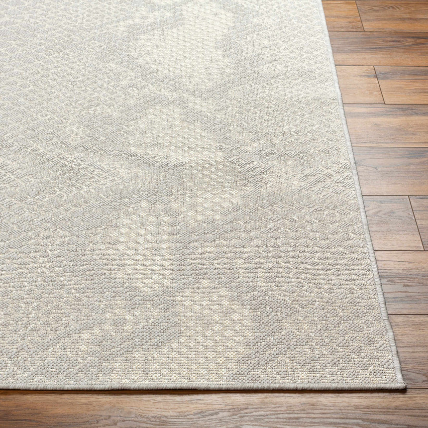 Estee Cream Snake-Patterned Area Rug - Clearance