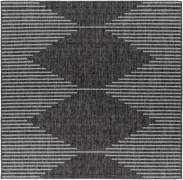 Close-up of the Stephan Area Rug with a black and cream geometric Southwestern-inspired design. Design-Square-67