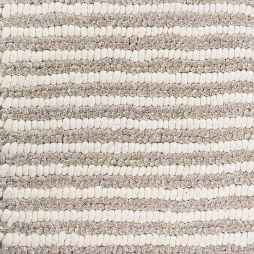 Close-up of the Sula Area Rug. Hand woven wool rug with cream and gray horizontal stripes. Natural fibers. Swatch