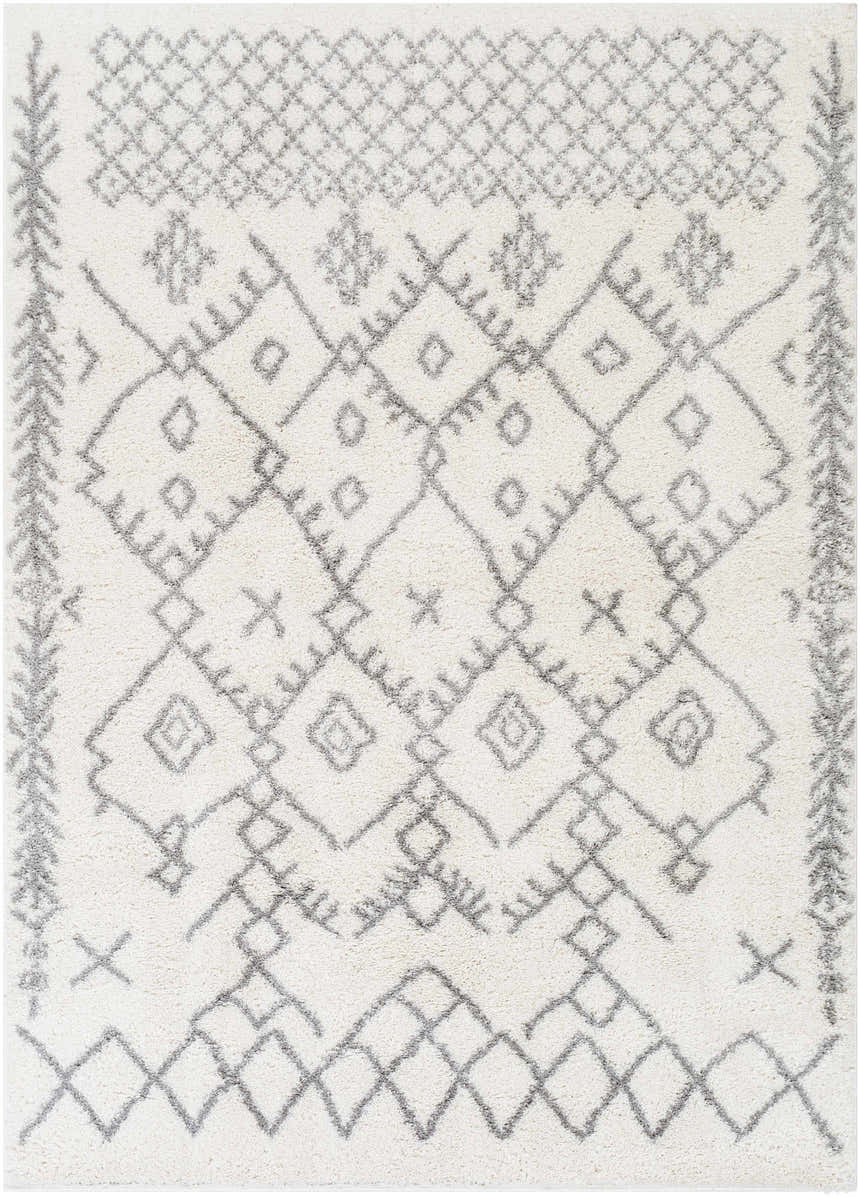 Close-up of Sutterton Area Rug. Cream rug with gray geometric diamond and tribal-inspired pattern. Plush texture. Design-Rectangle-5373