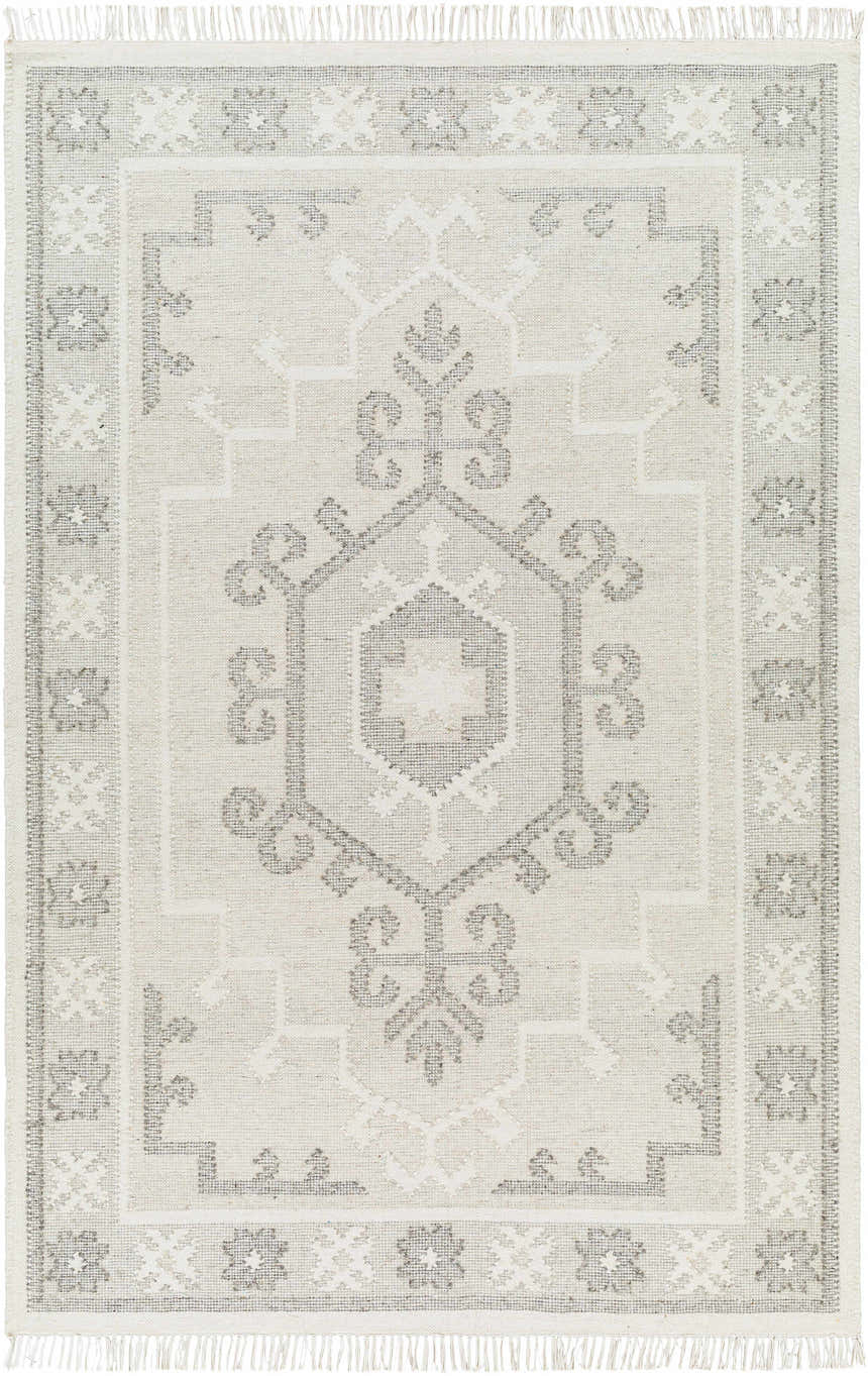 Close-up of the hand woven Afra Area Rug. Farmhouse style rug in cloud gray and dark gray with a traditional geometric pattern. Design-Rectangle-576
