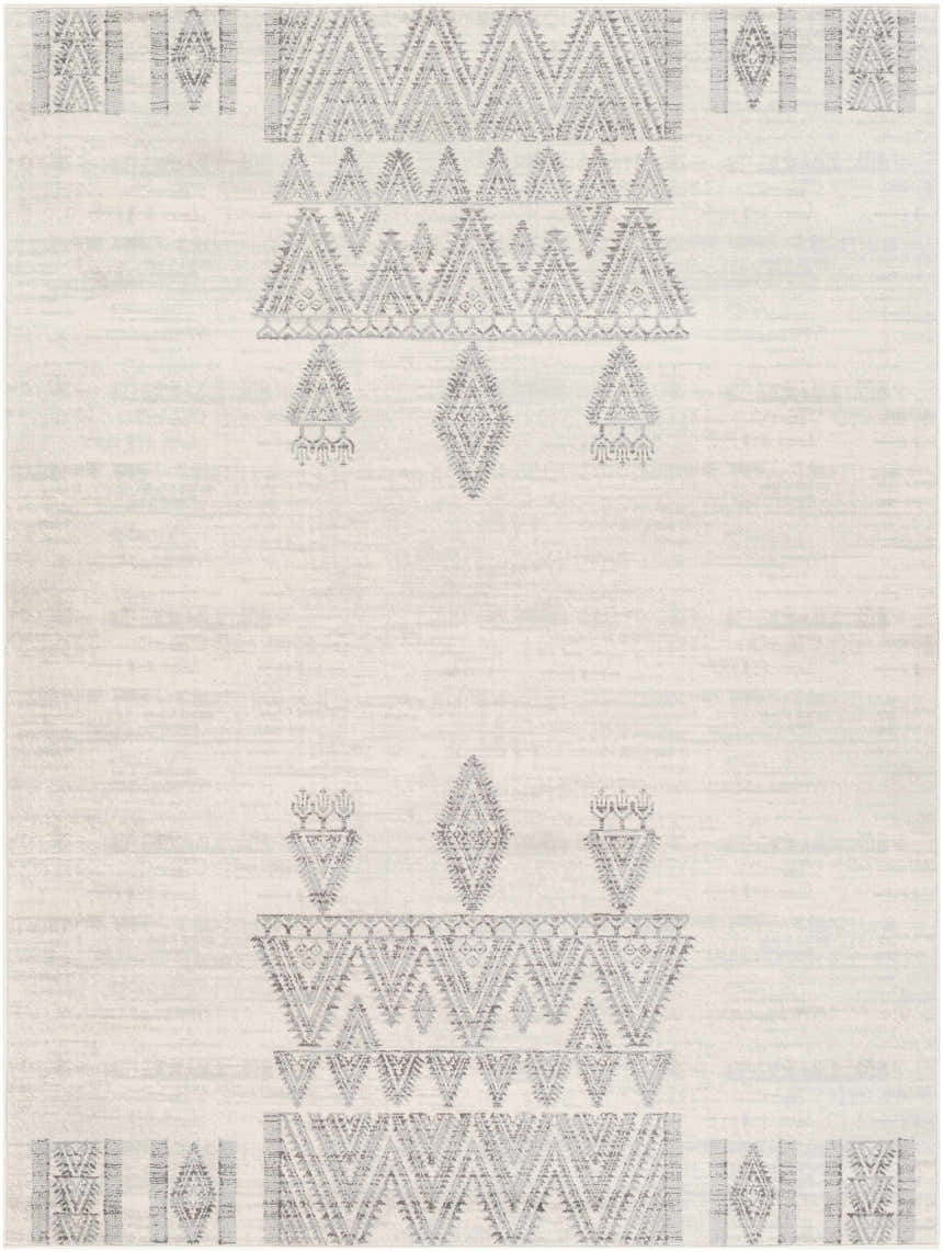 Close-up of the Wakita Light Gray Tribal Rug. Features a geometric, tribal-inspired pattern in charcoal and light gray on an off-white base. Design-Rectangle-537