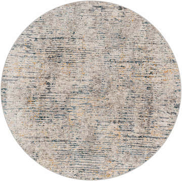 Close-up of the round Sywell Luxe Fringe Rug. Beige, blue, charcoal, and tan colors create a contemporary abstract design. Design-Round-53