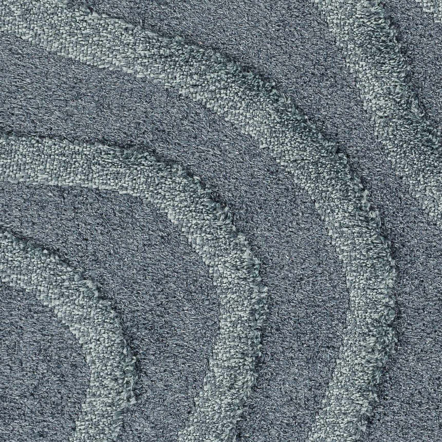 Close-up of the Taluya Area Rug showing a striped pattern and shag texture in shades of blue and gray. Swatch