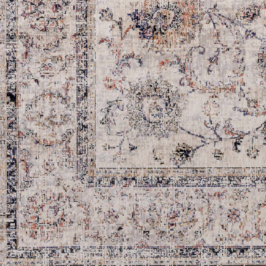 Close-up of the Temelec Area Rug, a beige polyester rug with burnt orange, charcoal, and slate floral and oriental patterns. Swatch