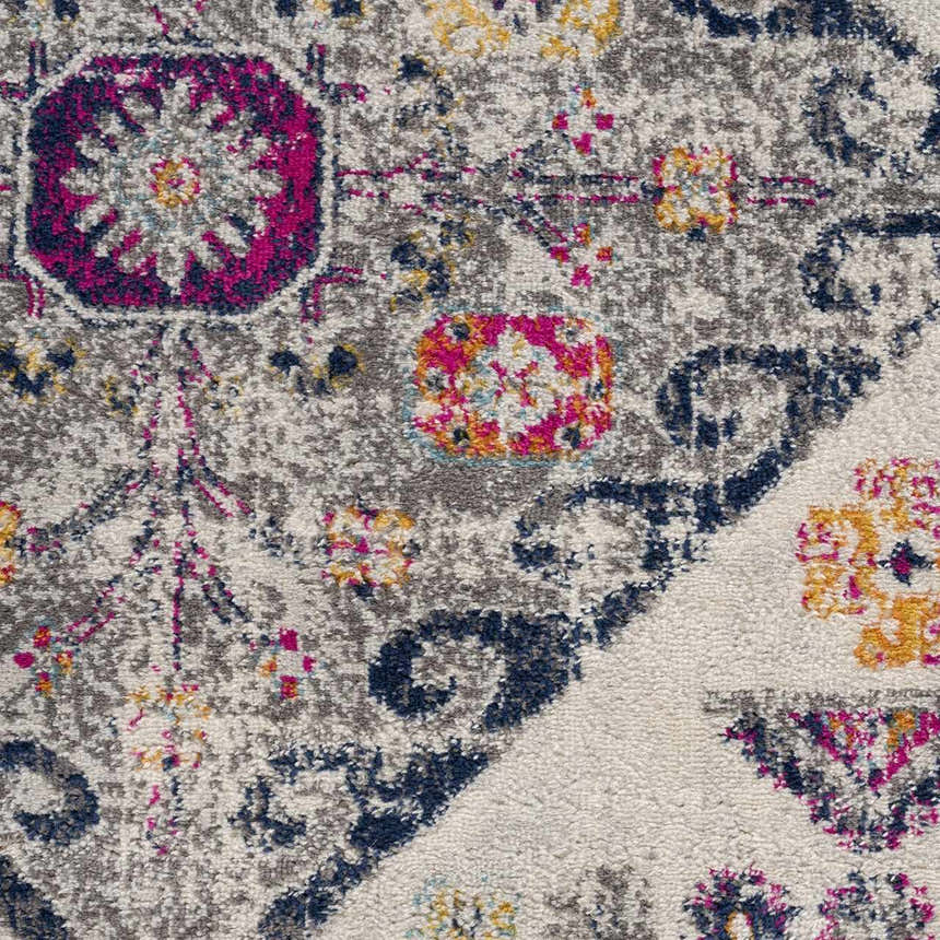Close-up of Tigriv Ivory 2312 Area Rug. Features gray, ivory, navy, and orange bohemian-style floral pattern. Texture