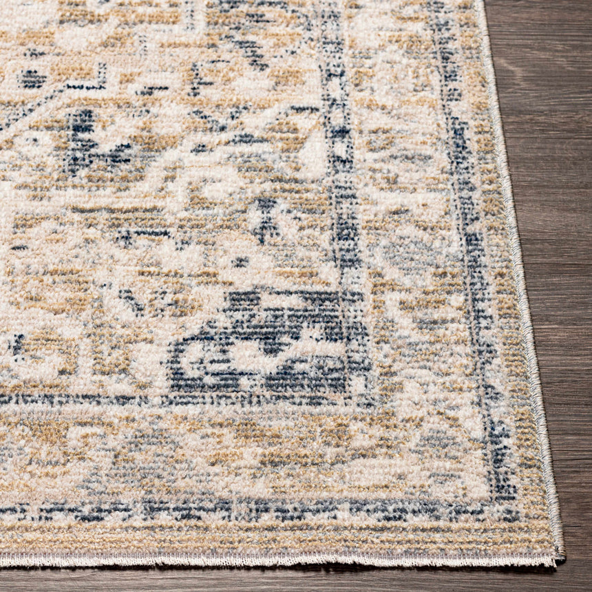 Buguey Cream Area Rug - Clearance