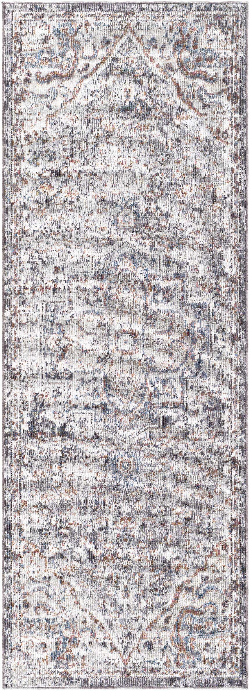 Close-up of the Tongala Indoor & Outdoor Rug. Beige, blue, and brick red oriental rug pattern. Machine woven texture. Design-Runner-2773