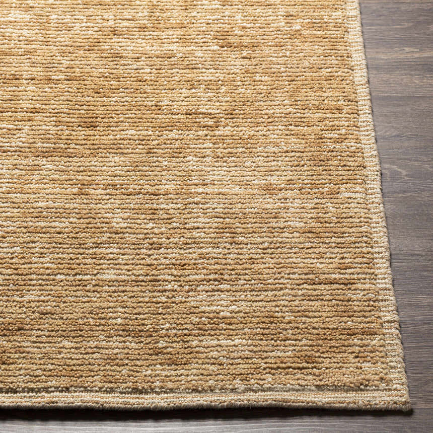 Close-up of the hand-loomed Vezirhan Area Rug. Dark red and peach cotton and wool blend with a subtle contemporary pattern. Front