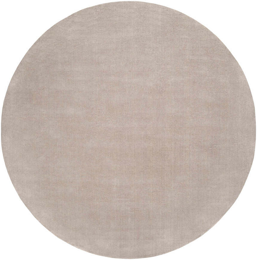 Close-up of a round Brockton Solid Tan Area Rug. Hand-loomed wool rug with subtle striped texture. Design-Round-8