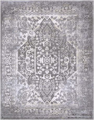 Close-up of the Watford Updated Traditional Tibetan Rug. Charcoal, gray, and ivory floral pattern with vintage distressed texture. Design-Rectangle-710103
