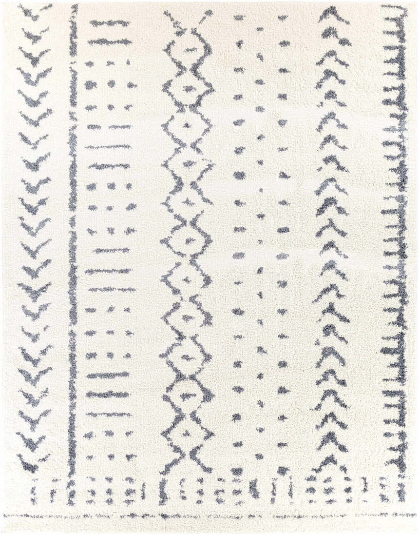 Close-up of the Wedowee Area Rug. White shag rug with gray geometric, bohemian-inspired pattern. Soft texture. Design-Rectangle-710103