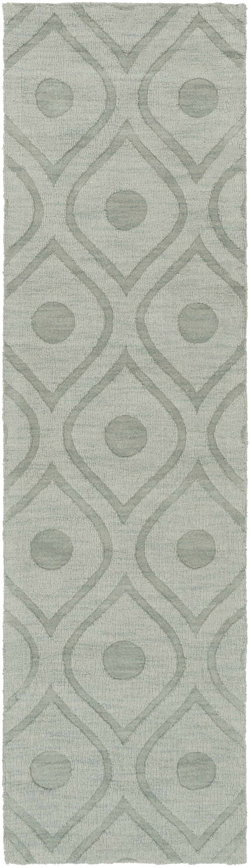 Close-up of the light gray Welaka Eye Pattern Wool Rug, featuring a textured geometric design with circles and diamond shapes. Design-Runner-38