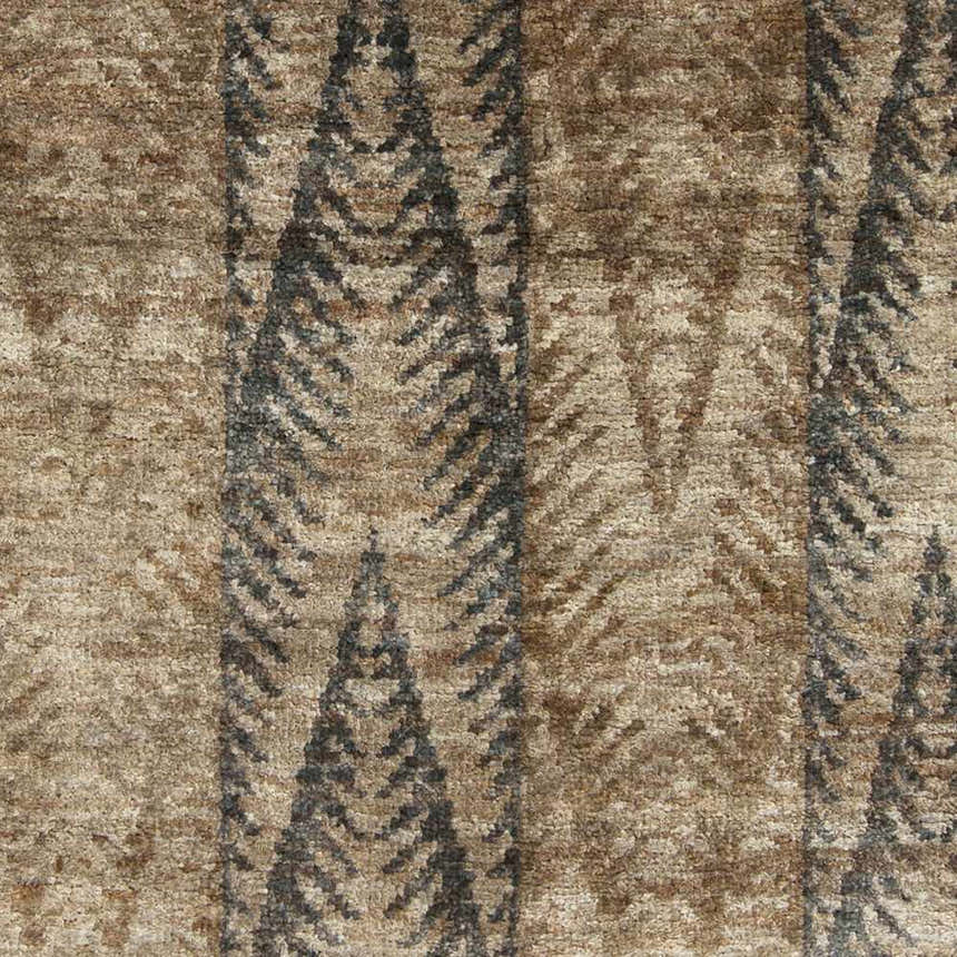 Close up of the hand knotted Wilburton Jute Carpet showing the brown jute texture and contemporary tree pattern. Swatch