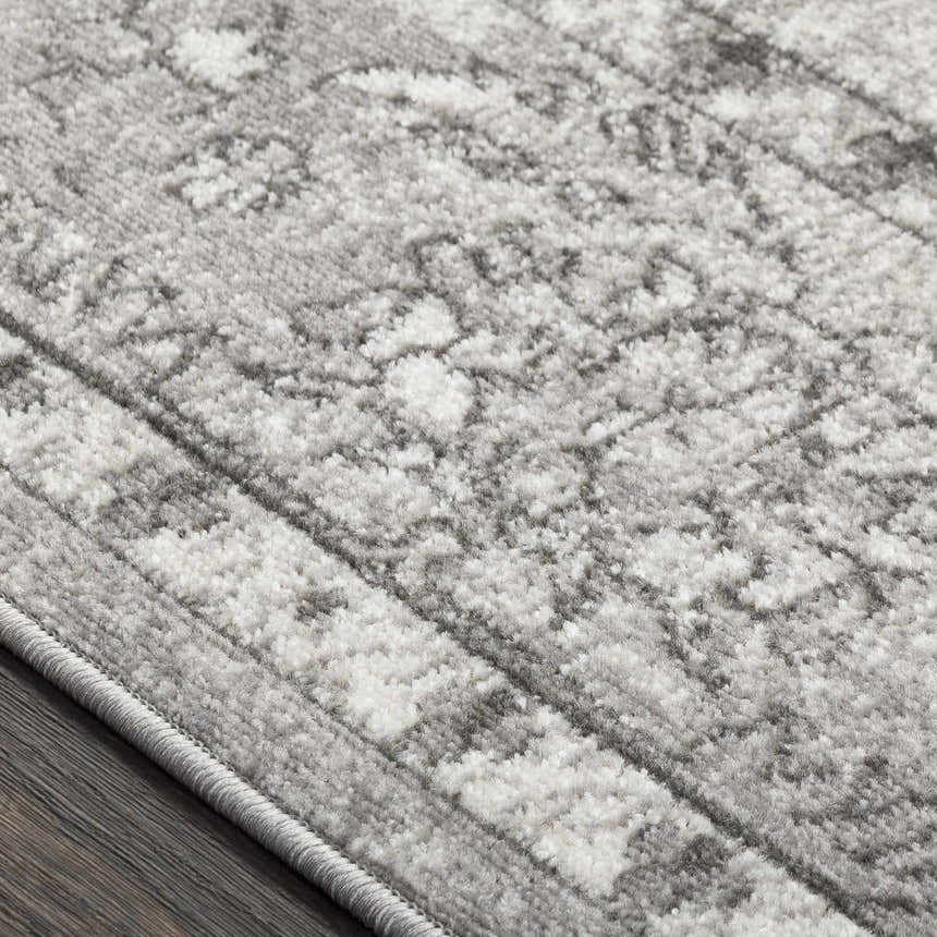 Close-up of the Winstonville Clearance Rug. The rug has a gray and white pattern and texture. Texture