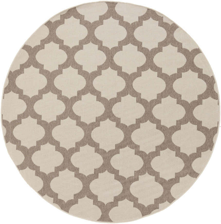 Close-up of the round Winterville Area Rug. Beige rug with a dark red quatrefoil pattern. Farmhouse style. Design-Round-73