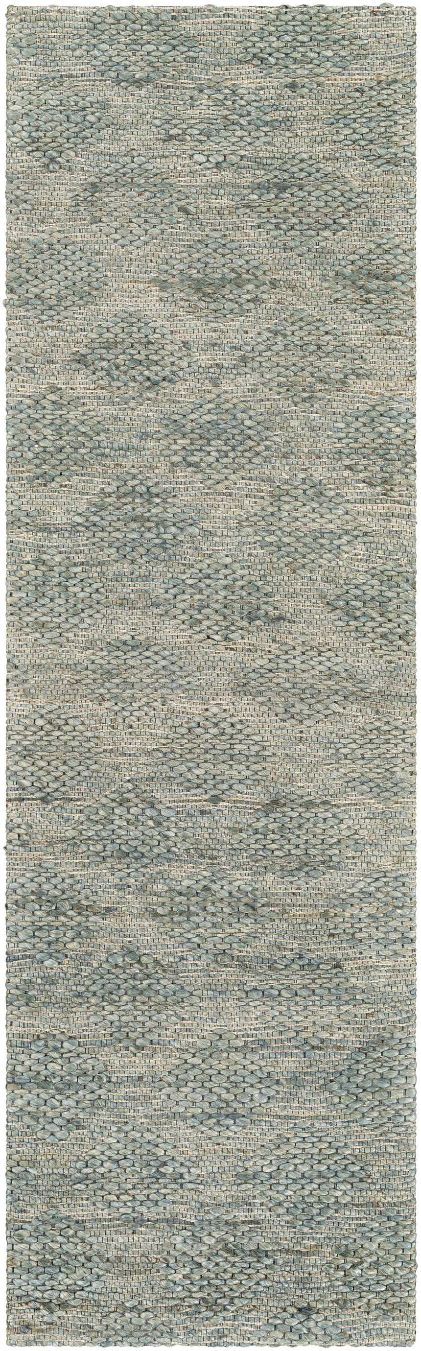 Close-up of the Wishaw Sage Green Jute Rug showing its hand-woven texture and subtle brown and green color variations. Design-Runner-268