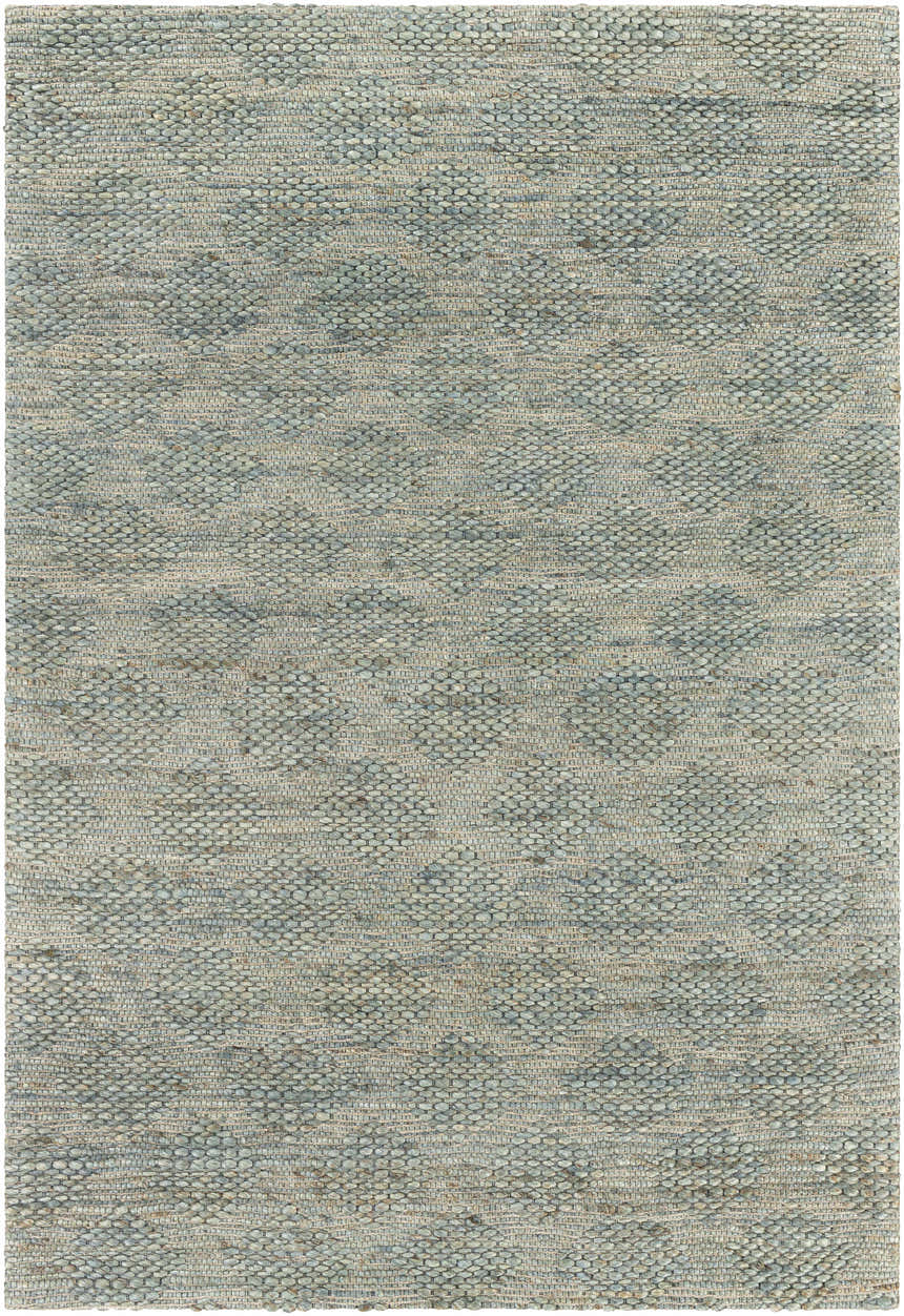 Close-up of the Wishaw Sage Green Jute Rug, a hand-woven rug with a textured, geometric pattern in sage, green, and brown tones. Design-Rectangle-576