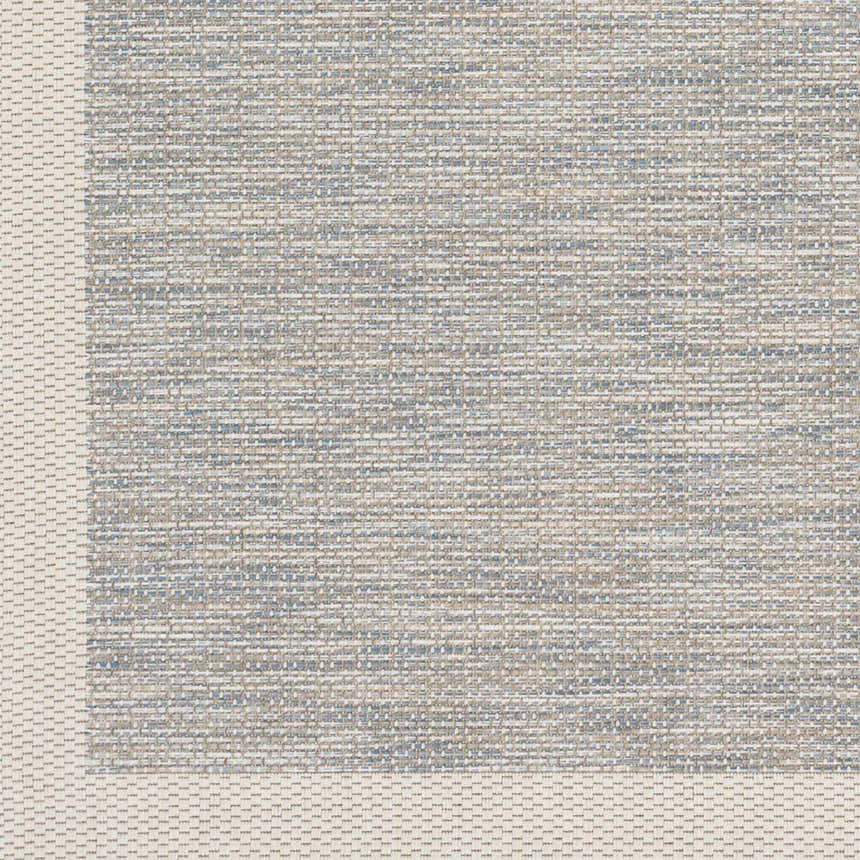 Close-up of the woven texture of the Wishon Area Rug. Colors are blue, cream, and taupe. Swatch