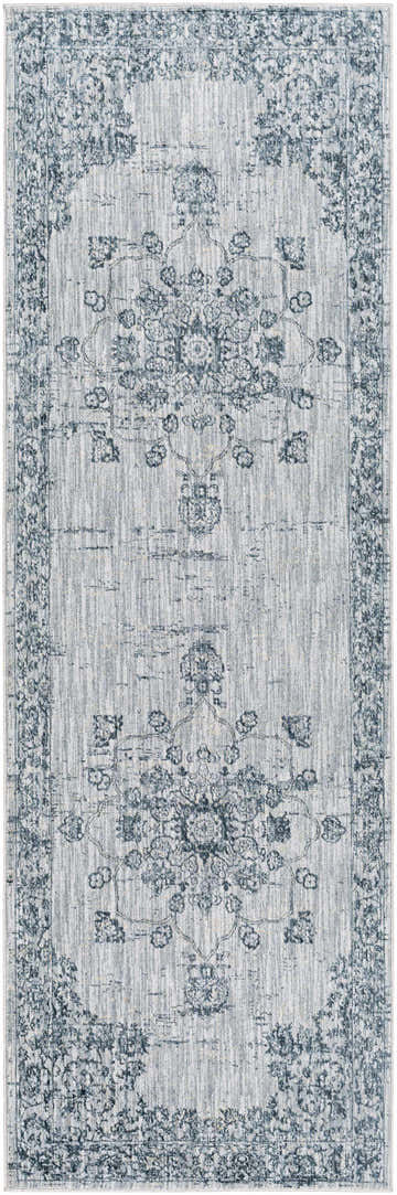 Close-up of the Wandina Traditional Luxe Rug. Gray and blue floral pattern with a distressed, vintage look. Design-Runner-2773