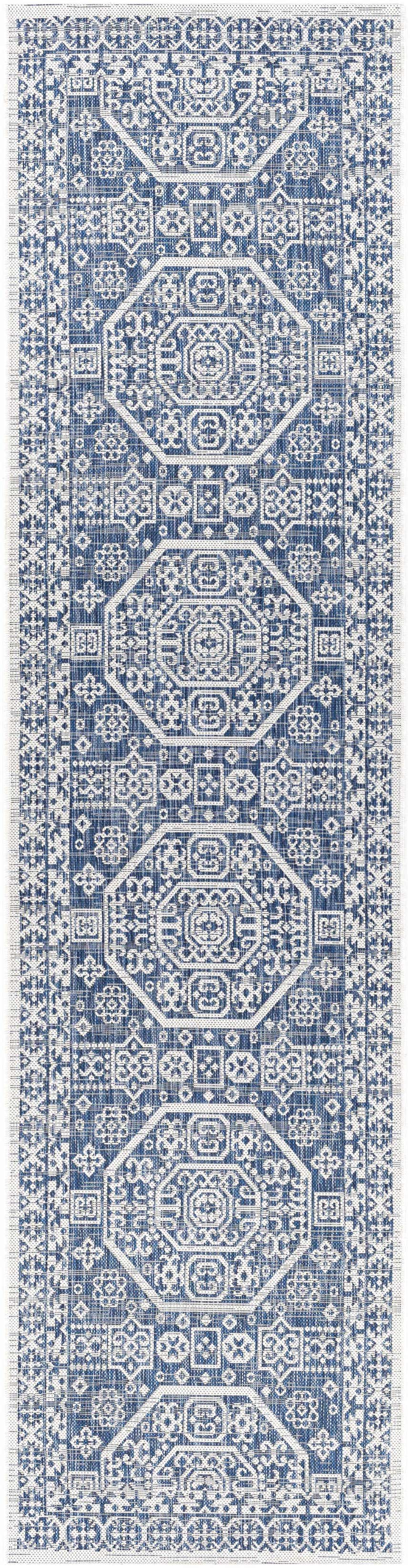 Close-up of the Windaroo Area Rug, a navy and off-white runner with a geometric, bohemian-inspired pattern. Design-Runner-2710