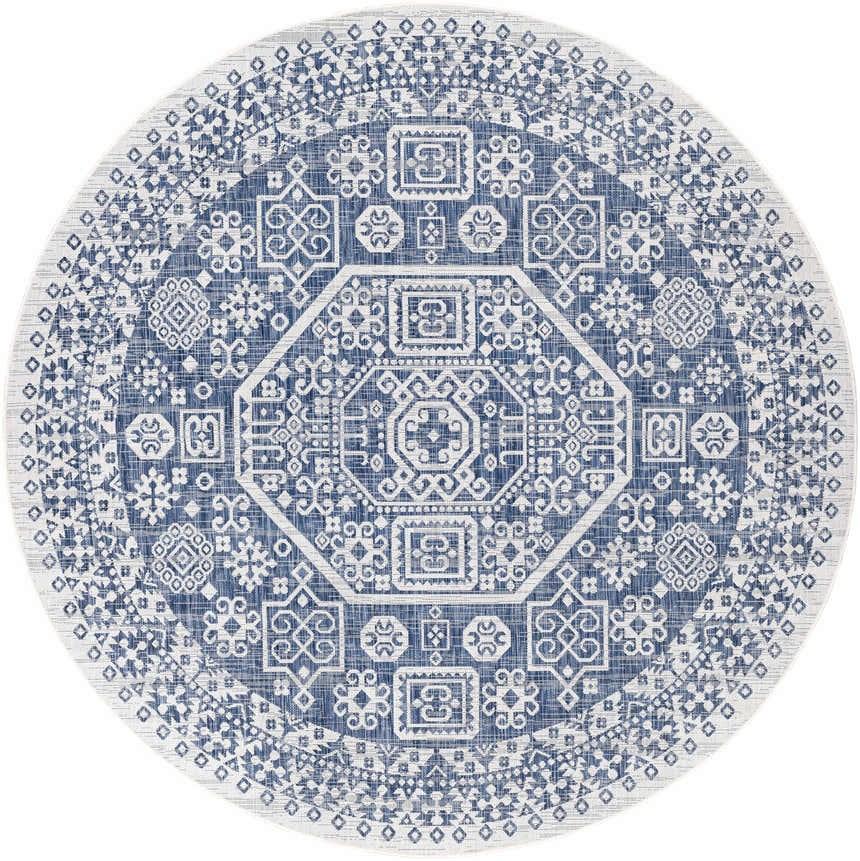 Close-up of a round Windaroo Area Rug. The rug has a blue and off-white bohemian-inspired geometric pattern. Design-Round-710