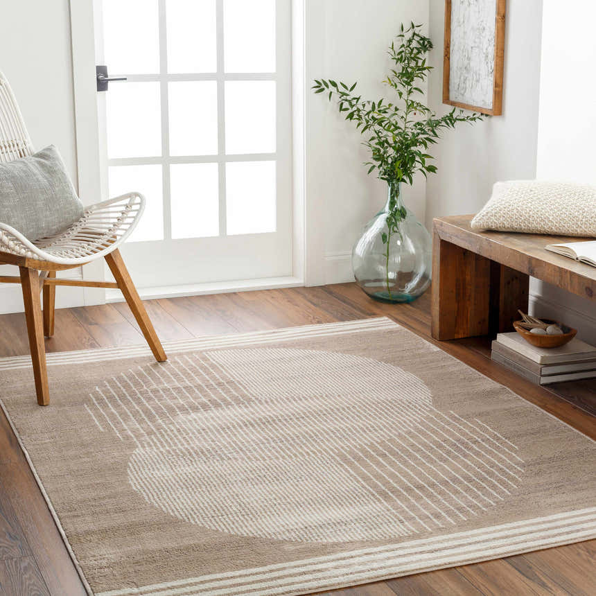 Entryway with Zeke Area Rug in bone and mocha, featuring a geometric design with stripes and circles. Roomscene-Rectangle