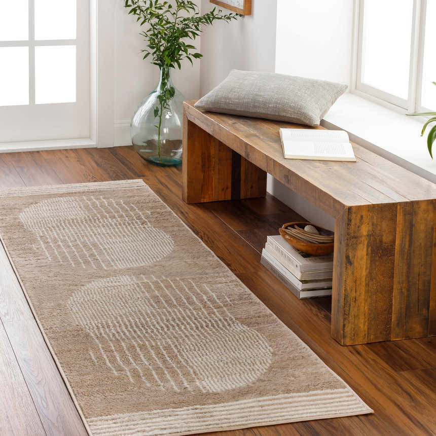 Entryway scene with a Zeke Area Rug runner, wooden bench, and natural light. Geometric bone and beige pattern. Roomscene-Runner