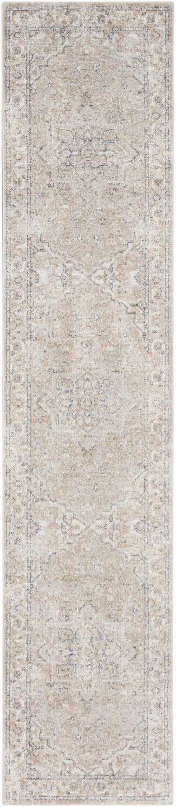 Close-up of Nourison Astra Beige Vintage Rug. Machine-made polyester rug with a distressed, traditional pattern.