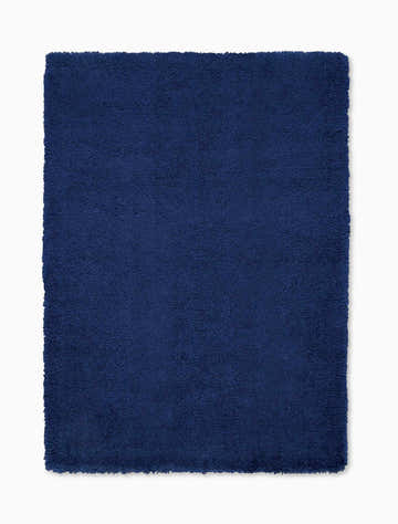 Close-up of the Calvin Klein Chicago Shag Navy rug. Soft, dense texture and rich navy color. Modern shag rug.