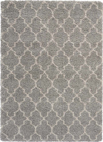 Close-up of the Nourison Amore Ash Moroccan shag rug, featuring a gray and ivory geometric pattern.