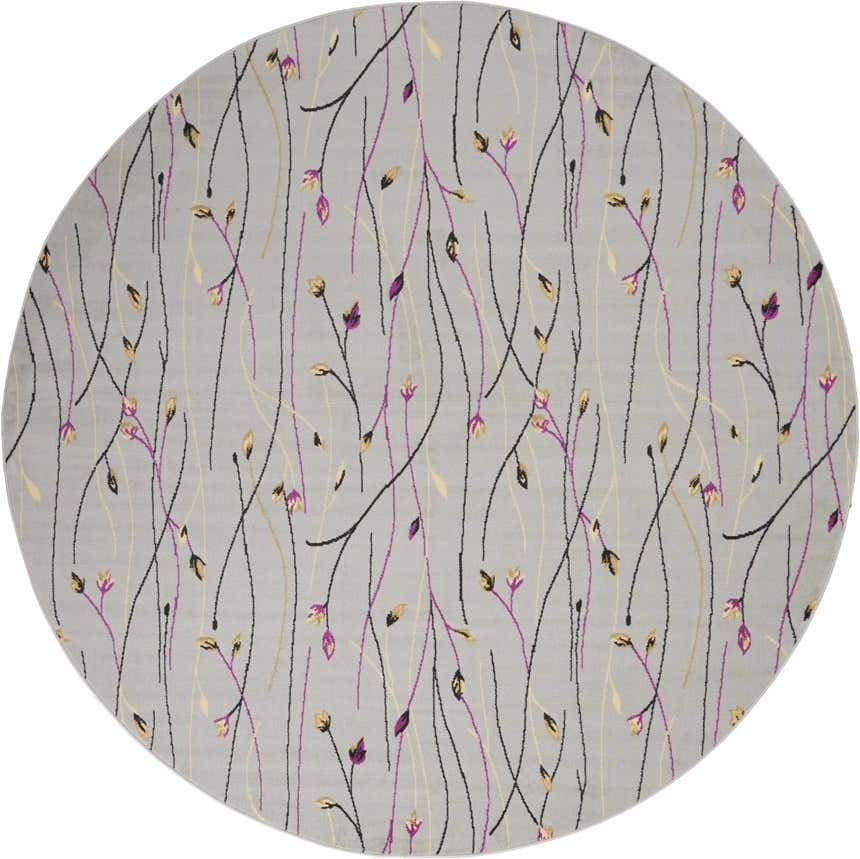 Round Nourison Grafix Grey rug with a contemporary floral design featuring black, purple, and beige accents.