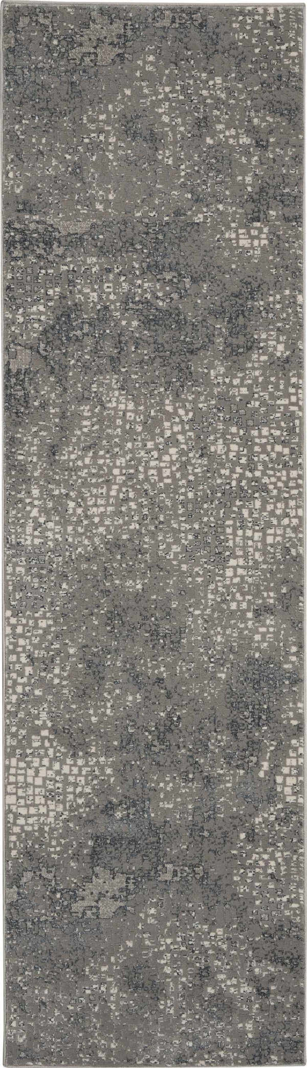 Close-up of the Michael Amini MA90 Uptown Grey rug. Modern design with gray tones and subtle, abstract patterns.
