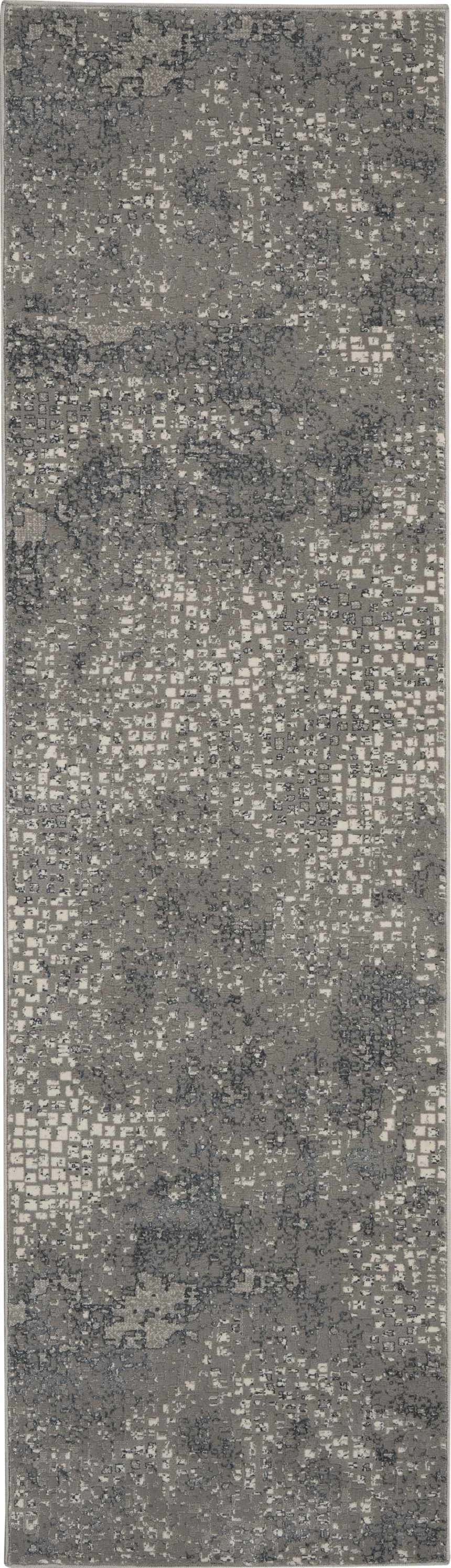 Close-up of the Michael Amini MA90 Uptown Grey rug. Modern design with gray tones and subtle, abstract patterns.