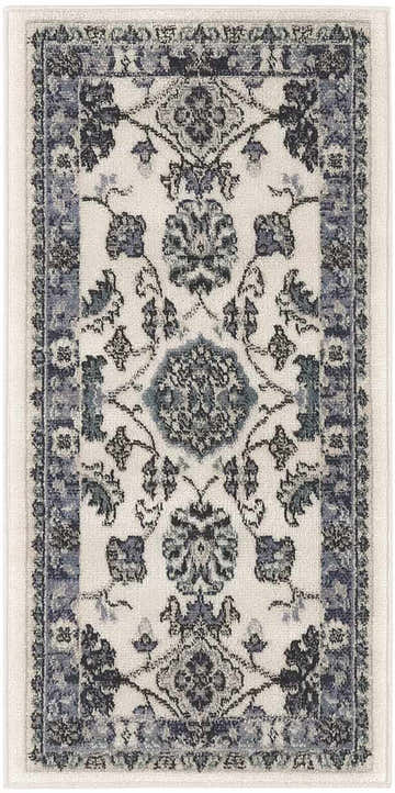 Close-up of Nourison Essentials Ivory Blue Vintage Area Rug showing floral pattern and chestnut accents.