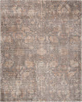 Close-up of Nourison Lucent Flint vintage rug. Bamboo silk-like fiber with distressed floral pattern in flint and beige.