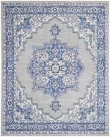 Detailed Nourison Whimsicle rug in grey and blue. Farmhouse style with a central medallion and floral border pattern.