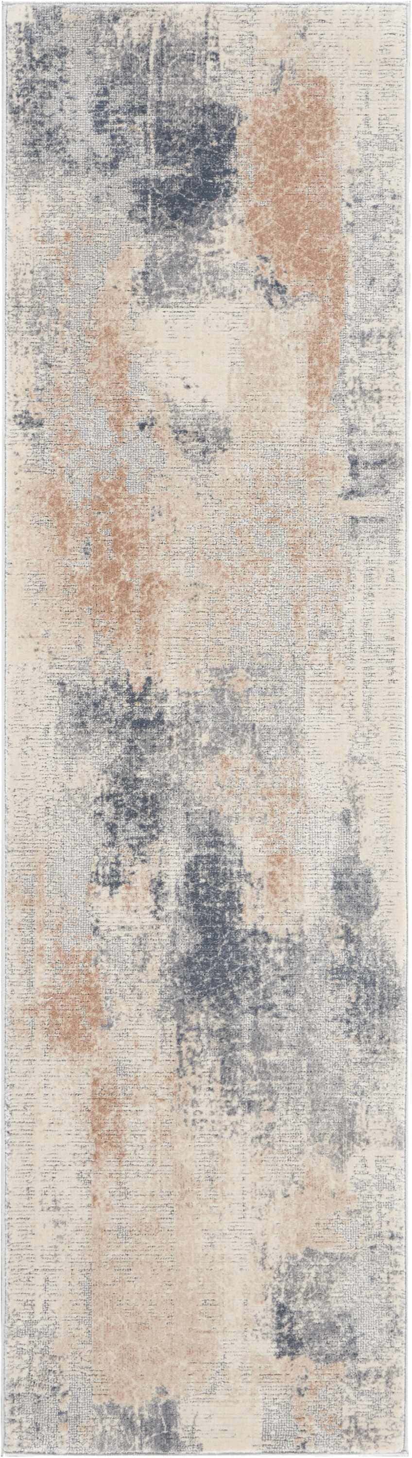 Close-up of the Nourison Rustic Textures rug. Beige, gray, and tan abstract pattern with a distressed, modern design.