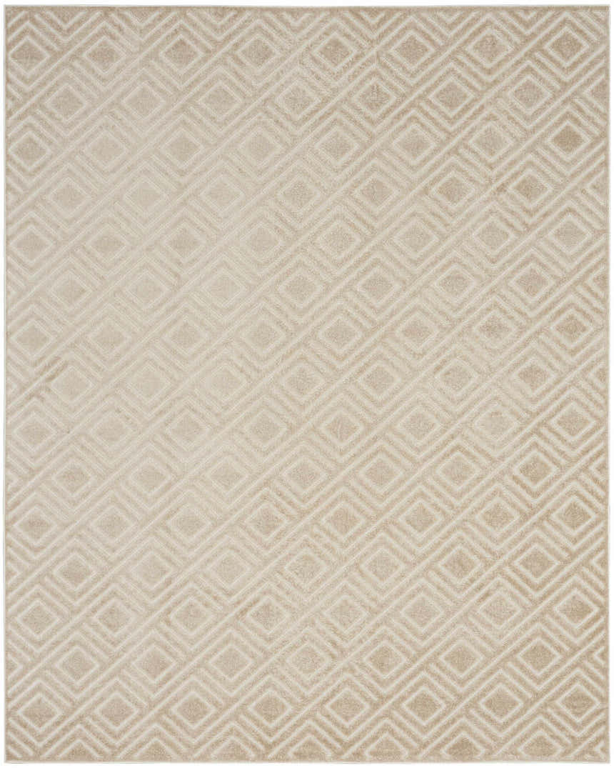 Close-up of the Nourison Care Free Beige rug featuring a subtle, geometric diamond pattern. Mid-century modern style.