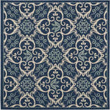 Close up of Nourison Caribbean Navy Contemporary Area Rug with floral and scroll pattern.