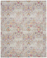 Close-up of Nourison Damask Multicolor Bohemian Area Rug. Features a detailed damask pattern in pink, blue, and gold on a cream background.