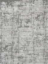 Close-up of the Nourison Symmetry Ivory/Taupe rug. Abstract, mid-century modern design with ivory and taupe colors.